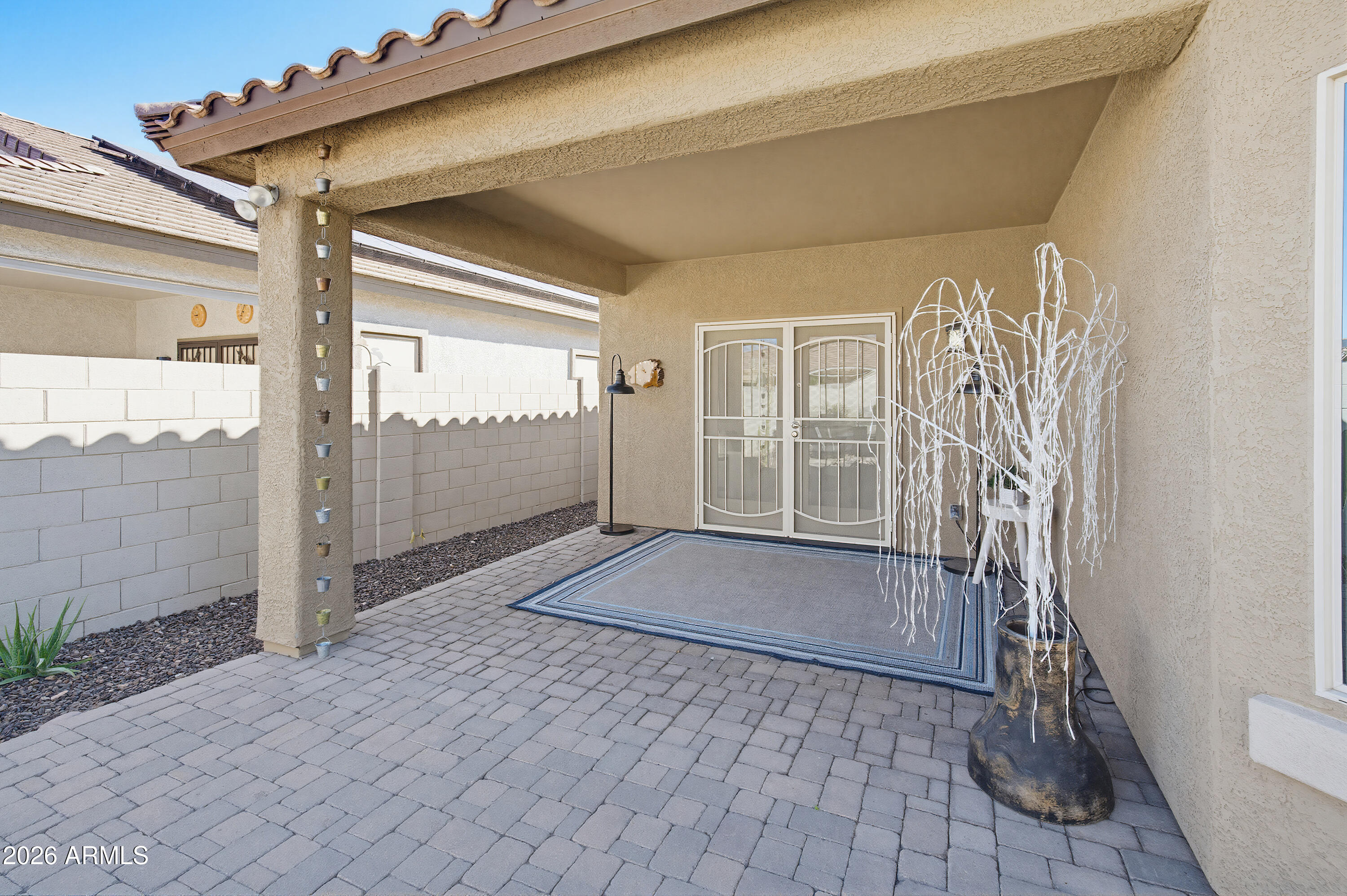 10772 West Yearling Road Peoria, AZ 85383 - Photo 35 of 39 a view of front door of a house