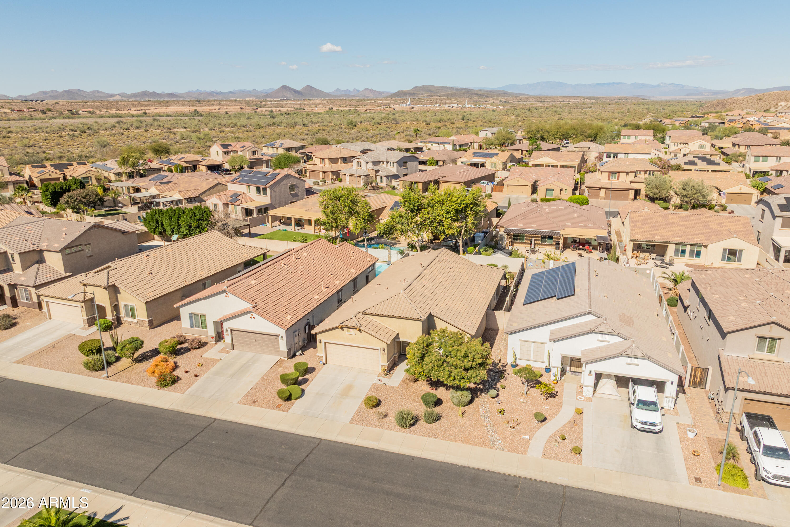 10772 West Yearling Road Peoria, AZ 85383 - Photo 37 of 39 an aerial view of residential building with parking