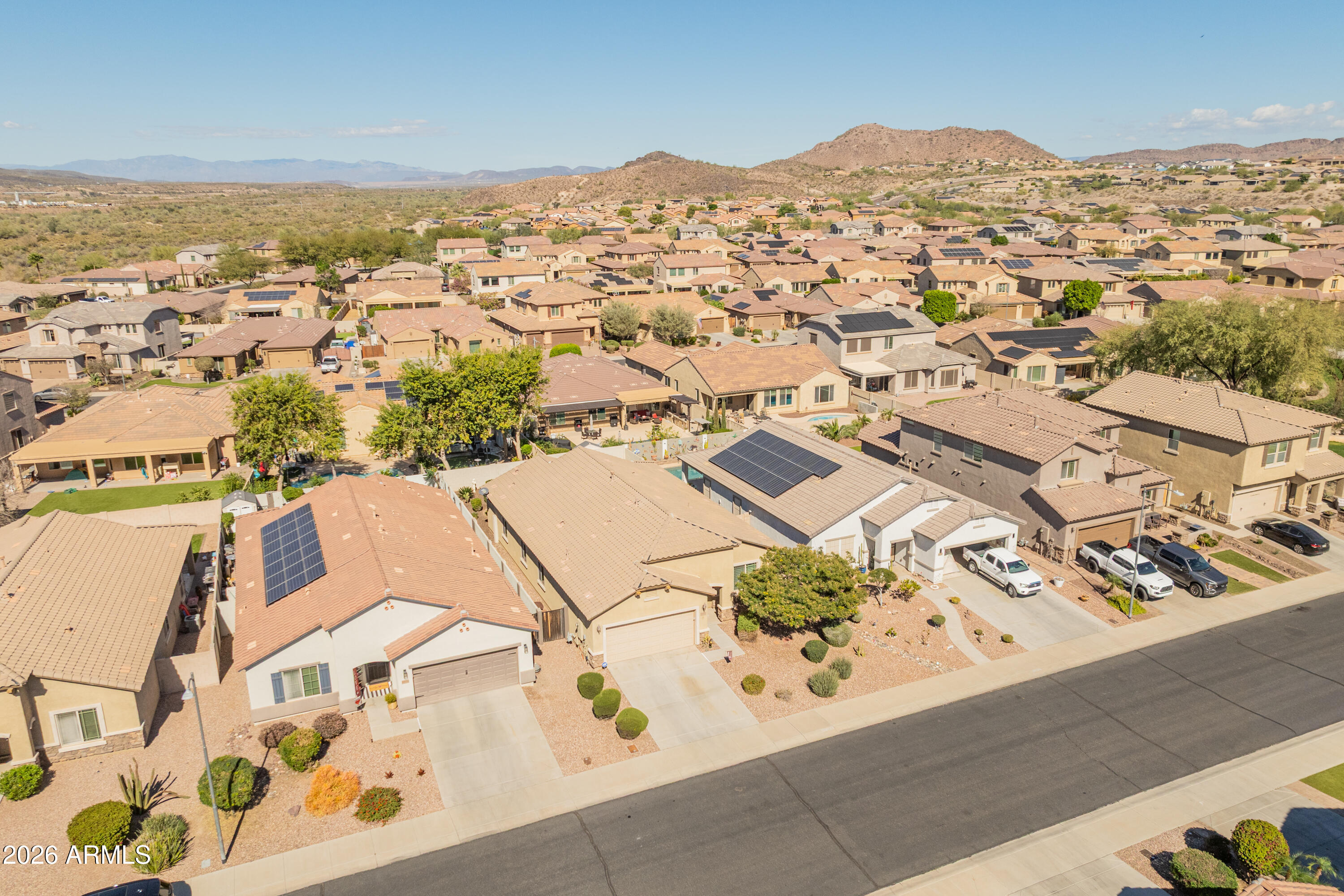 10772 West Yearling Road Peoria, AZ 85383 - Photo 38 of 39 an aerial view of residential houses with outdoor space