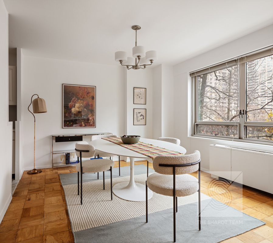 170 West End Avenue, Unit 2N Manhattan, NY 10023 - Photo 2 of 12 a view of a livingroom with furniture window and wooden floor