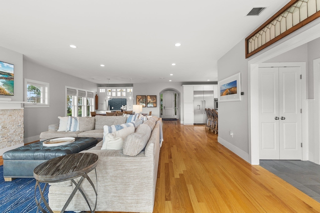 15 Buttonwood Lane Scituate, MA 02066 - Photo 13 of 42 a living room with furniture and a table