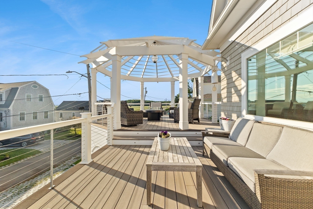 15 Buttonwood Lane Scituate, MA 02066 - Photo 17 of 42 a view of a living room with a large window