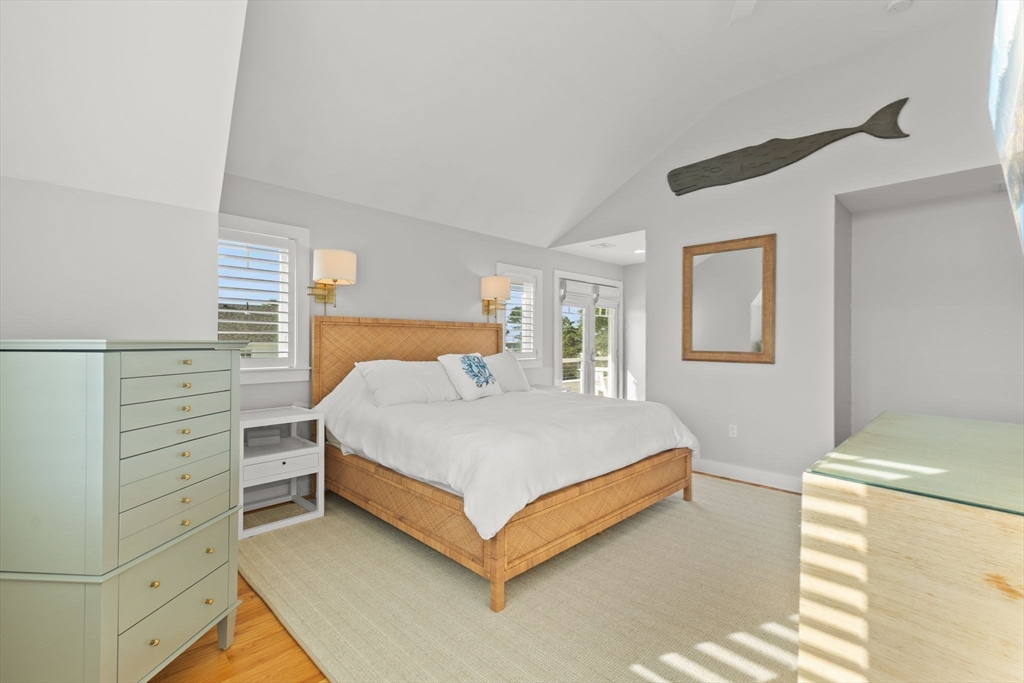 15 Buttonwood Lane Scituate, MA 02066 - Photo 22 of 42 a bedroom with a bed and a window