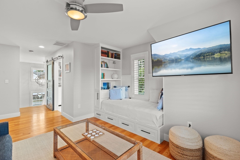 15 Buttonwood Lane Scituate, MA 02066 - Photo 32 of 42 a living room with a couch