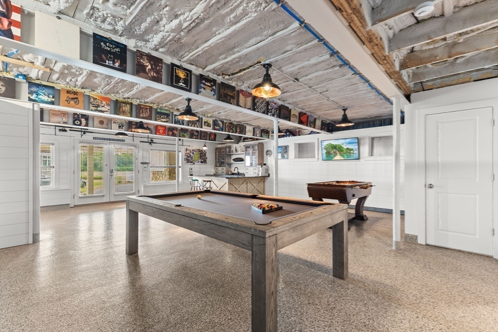 15 Buttonwood Lane Scituate, MA 02066 - Photo 35 of 42 a kitchen with a table and chairs