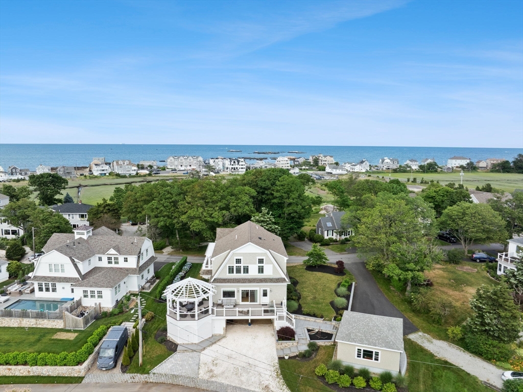 15 Buttonwood Lane Scituate, MA 02066 - Photo 40 of 42 an aerial view of a house with a garden and lake view