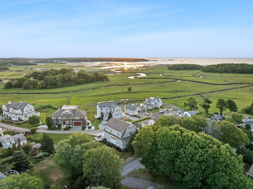 15 Buttonwood Lane Scituate, MA 02066 - Photo 42 of 42 a view of a grassy area with an ocean