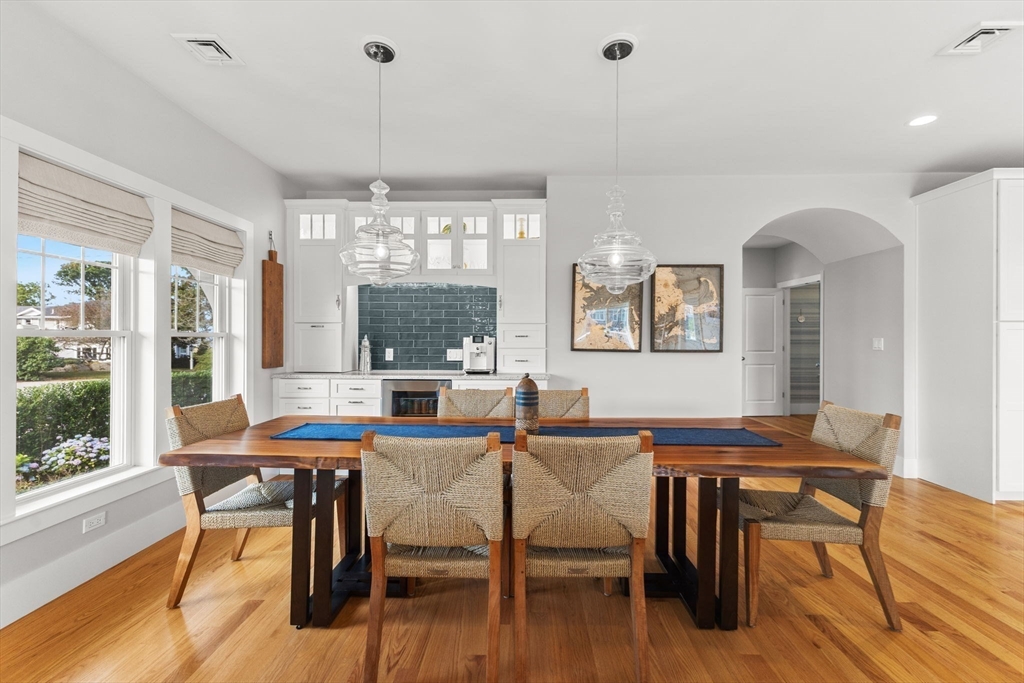 15 Buttonwood Lane Scituate, MA 02066 - Photo 7 of 42 a view of a dining room with furniture window and wooden floor