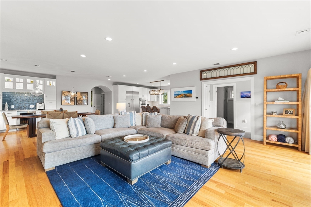15 Buttonwood Lane Scituate, MA 02066 - Photo 10 of 42 a living room with furniture and a flat screen tv