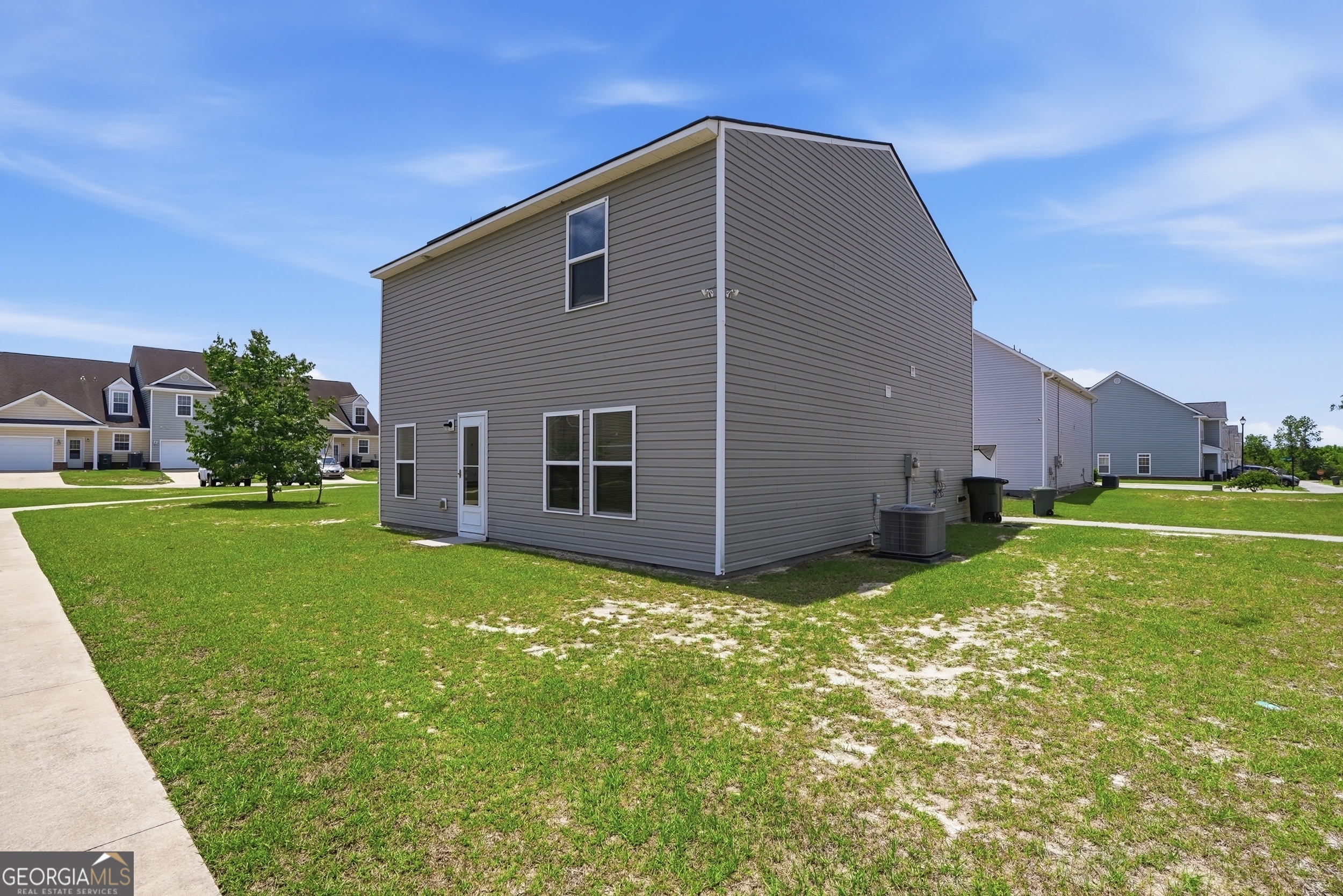 225 Rendell Lane Hinesville, GA 31313 - Photo 33 of 33 a house view with a garden space