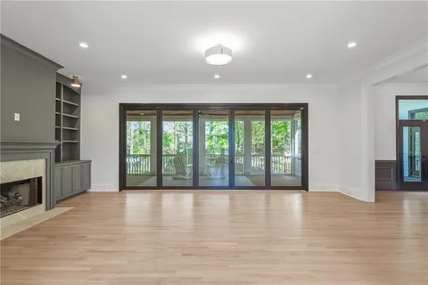 a view of a livingroom with wooden floor