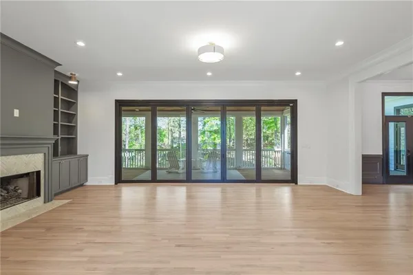 a view of a livingroom with wooden floor