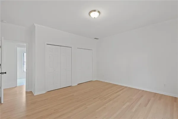 a view of a house with pool and sitting area
