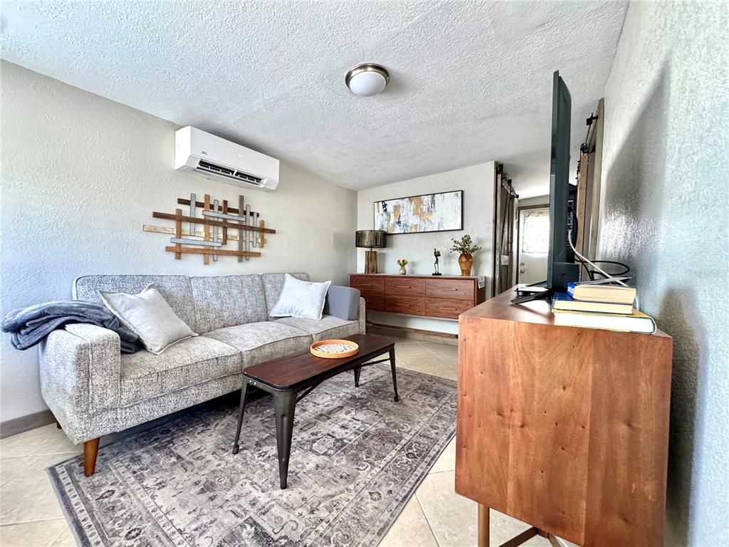 10315 Cortez Road West, Unit 643 Bradenton, FL 34210 - Photo 14 of 52 a living room with furniture and a table