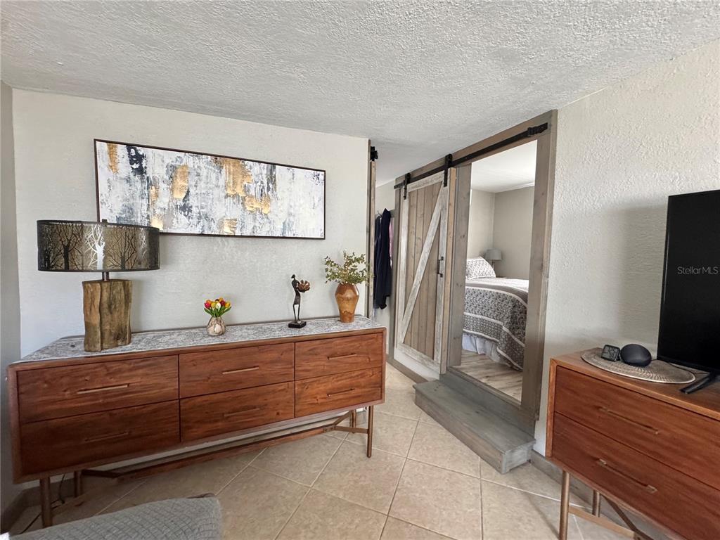 10315 Cortez Road West, Unit 643 Bradenton, FL 34210 - Photo 17 of 52 a kitchen with stainless steel appliances a refrigerator and a dresser