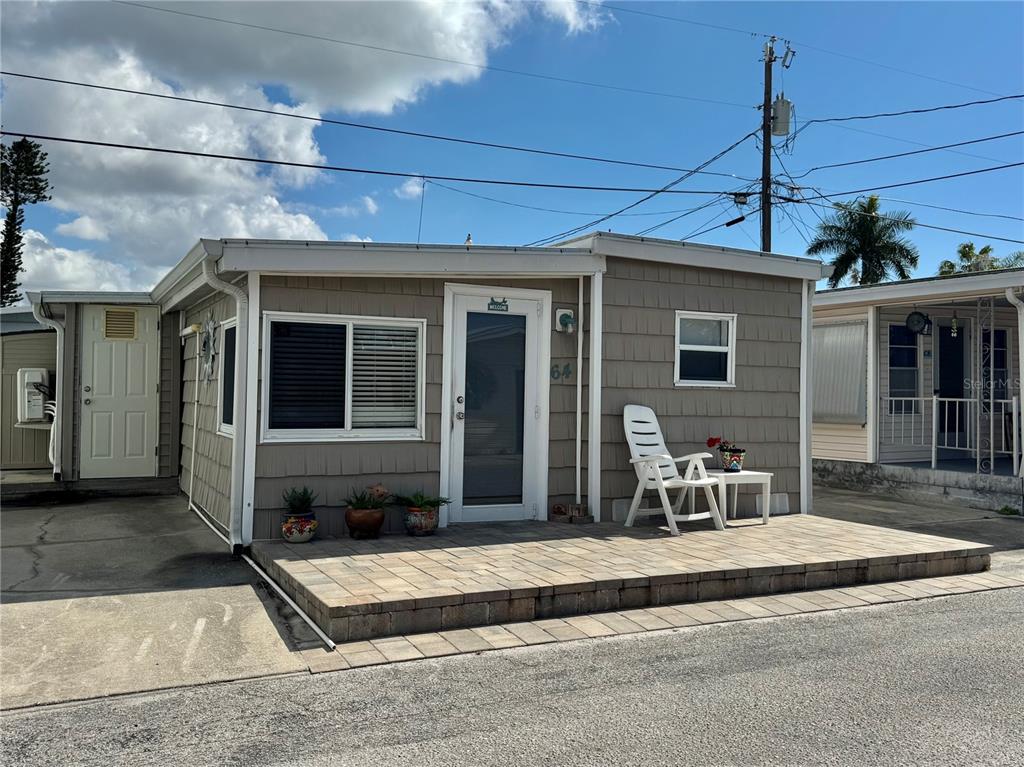 10315 Cortez Road West, Unit 643 Bradenton, FL 34210 - Photo 3 of 52 a front view of a house with a sitting area