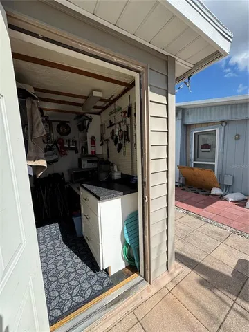 a view of backyard with outdoor seating