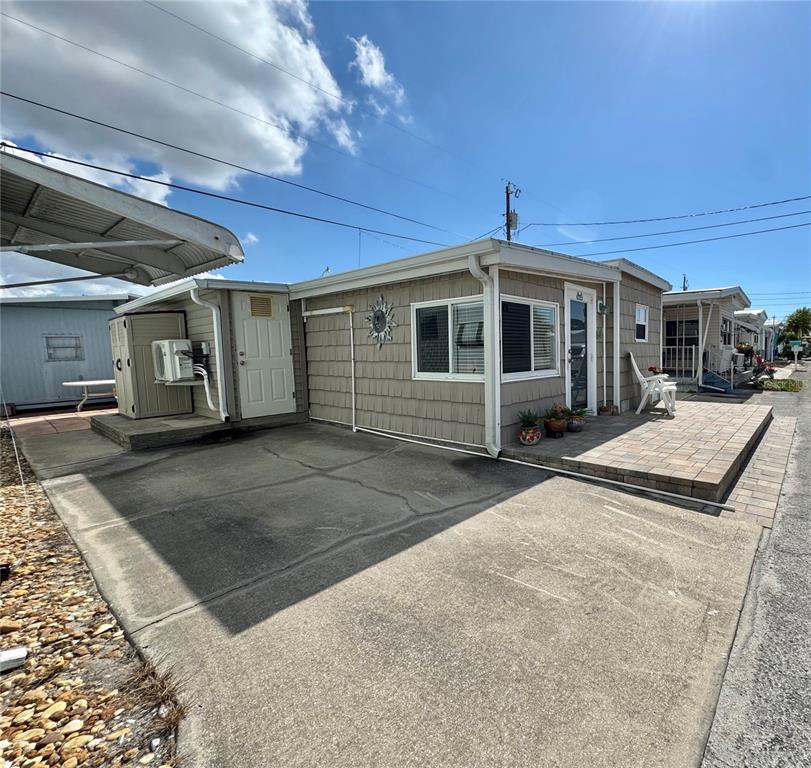 10315 Cortez Road West, Unit 643 Bradenton, FL 34210 - Photo 47 of 52 a front view of a house with a yard