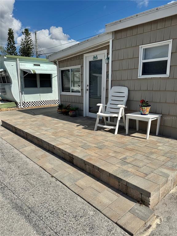 10315 Cortez Road West, Unit 643 Bradenton, FL 34210 - Photo 48 of 52 a backyard of a house with seating space