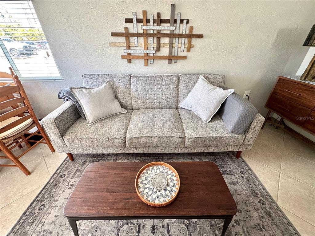 10315 Cortez Road West, Unit 643 Bradenton, FL 34210 - Photo 7 of 52 a living room with furniture and a rug