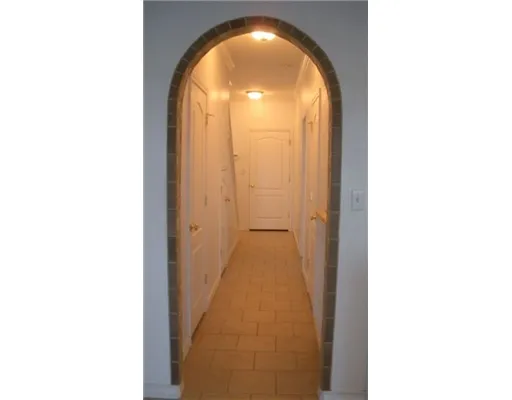 a view of a livingroom with a and white door