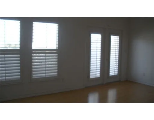 a black and white photo of a living room