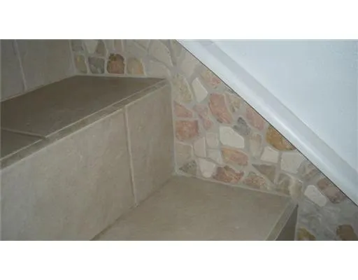 a black and white photo of a living room