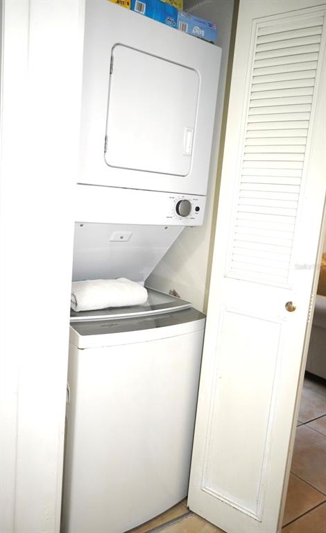 1664 Sunny Brook Lane, Unit 103 Palm Bay, FL 32905 - Photo 7 of 10 a utility room with dryer and washer