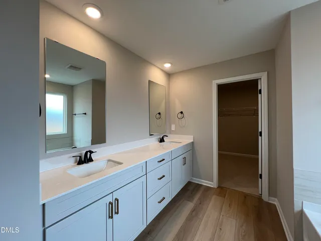 a view of empty room with a fireplace