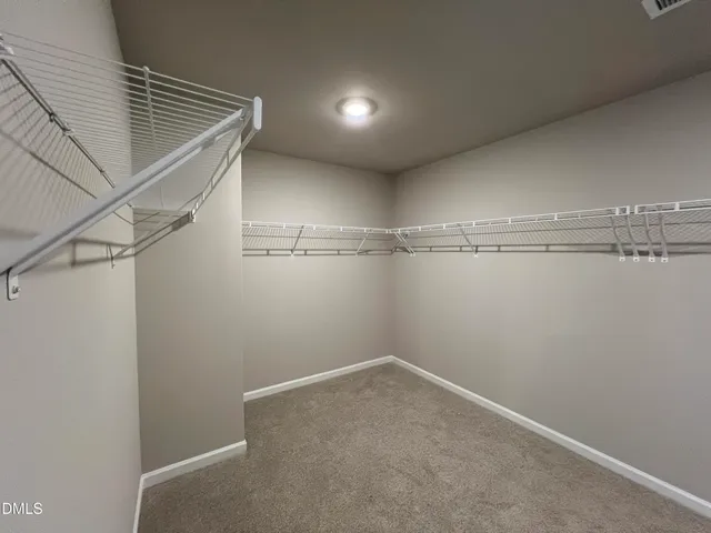 a bathroom with a tub and a shower