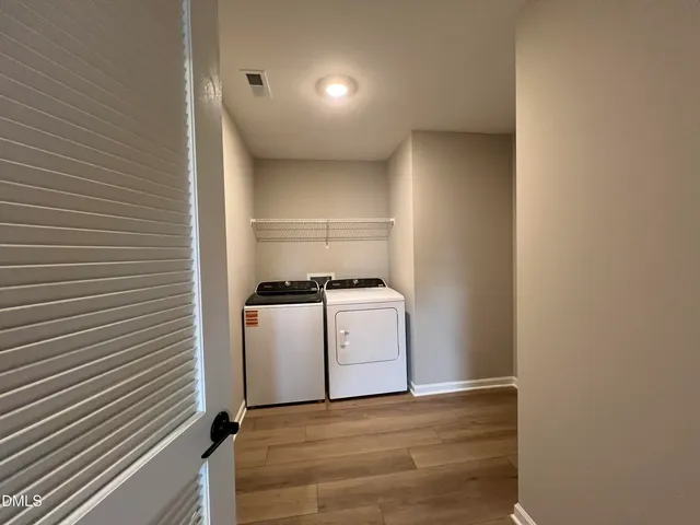 a view of a room with racks on the wall