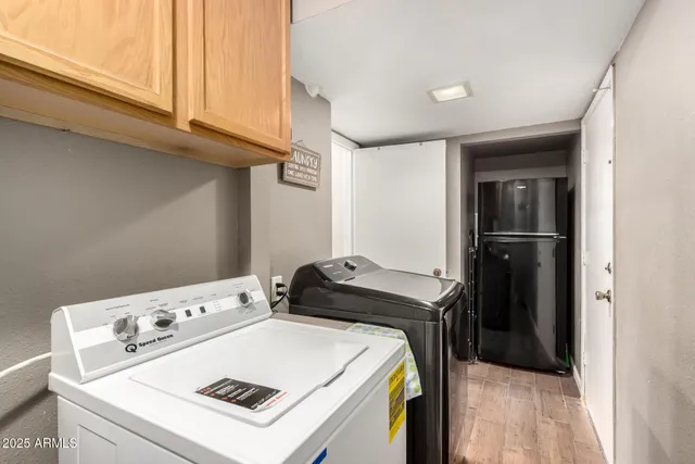 a view of a swimming pool with chairs