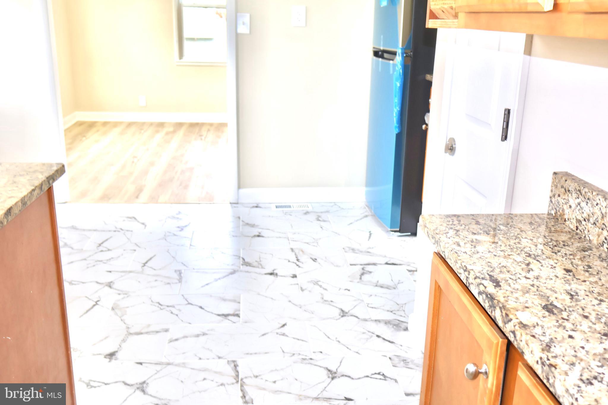 147 Deacon Road Fredericksburg, VA 22405 - Photo 26 of 97 a bathroom with a granite countertop sink and mirror