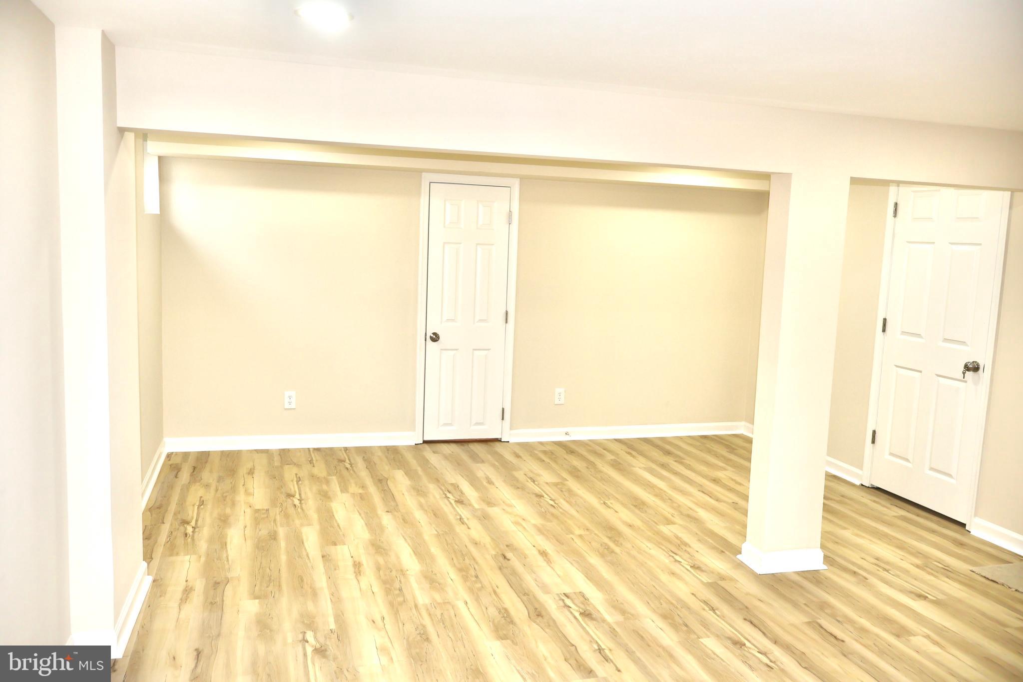 147 Deacon Road Fredericksburg, VA 22405 - Photo 57 of 97 a view of a room with wooden floor and a window
