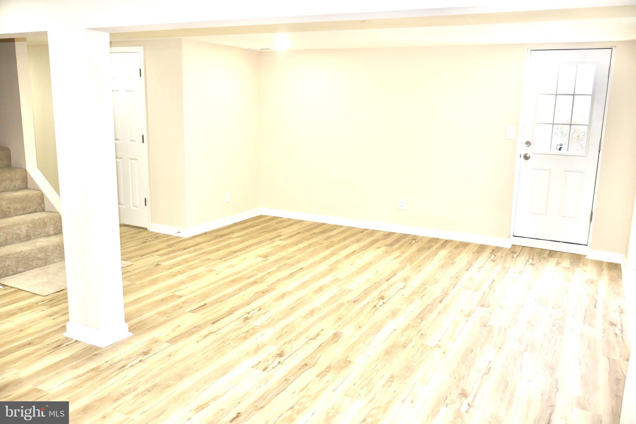 147 Deacon Road Fredericksburg, VA 22405 - Photo 59 of 97 a view of empty room with wooden floor