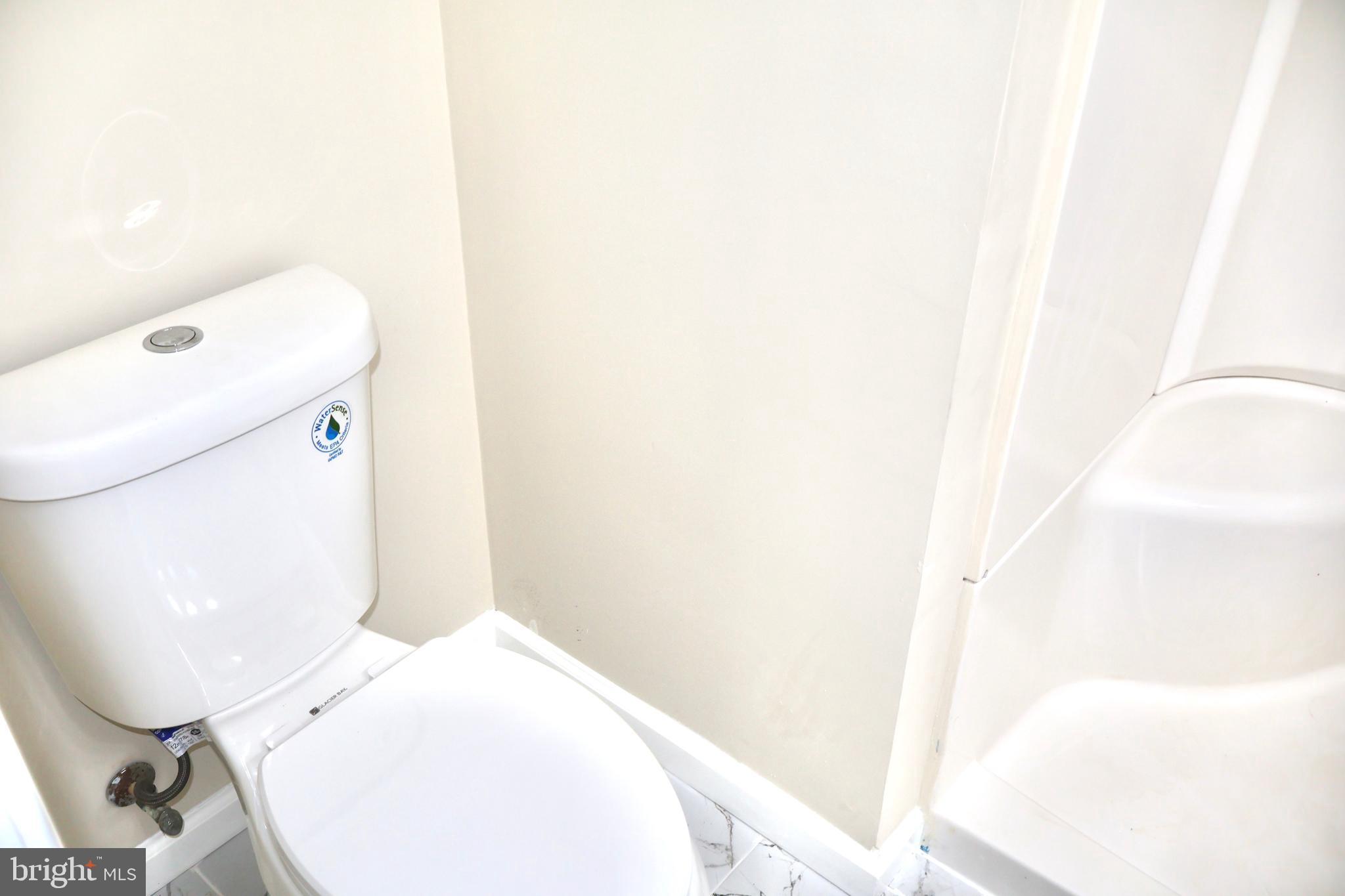 147 Deacon Road Fredericksburg, VA 22405 - Photo 76 of 97 a bathroom with a toilet and a mirror