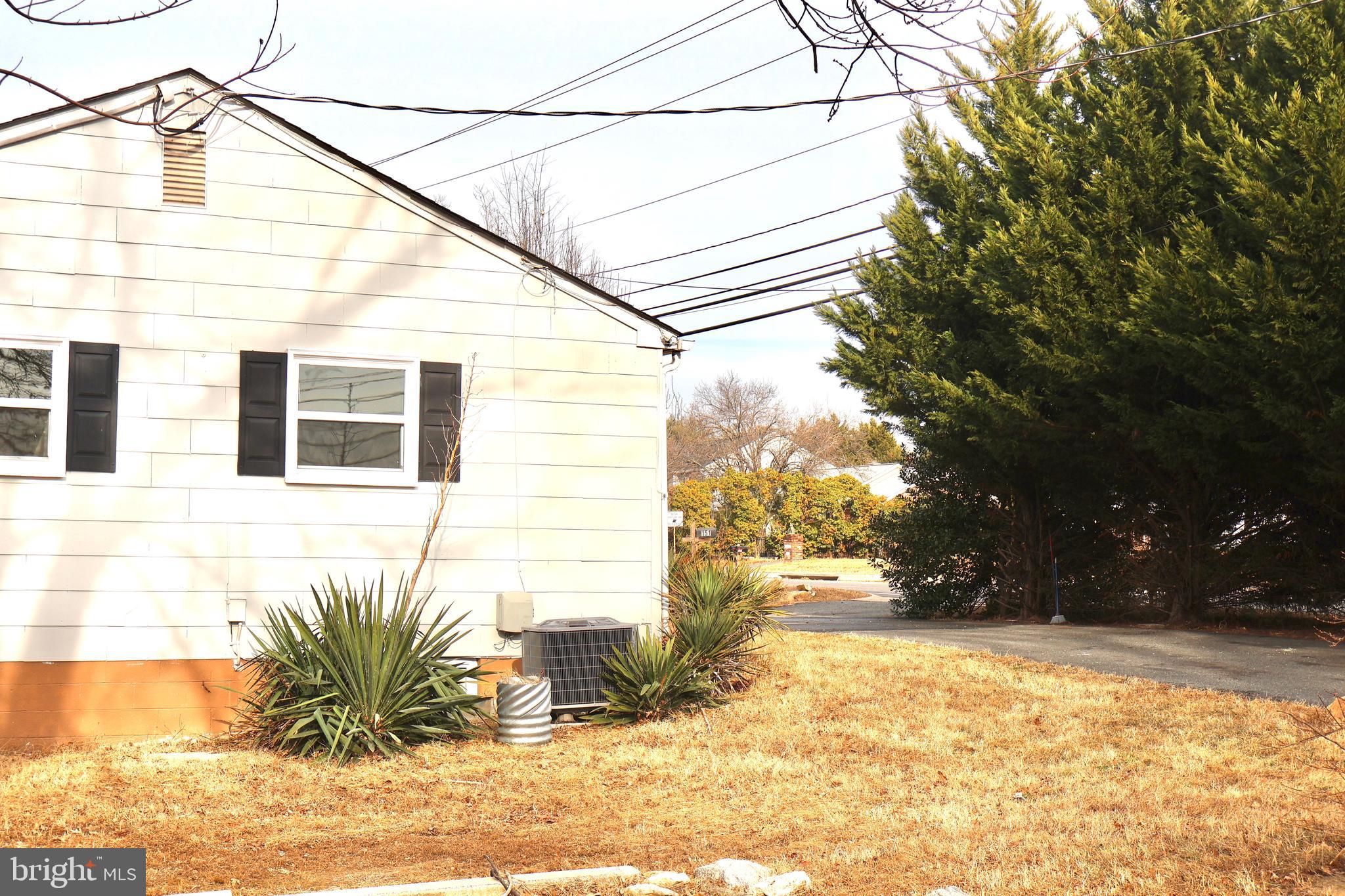 147 Deacon Road Fredericksburg, VA 22405 - Photo 95 of 97 a view of a house with snow on the road