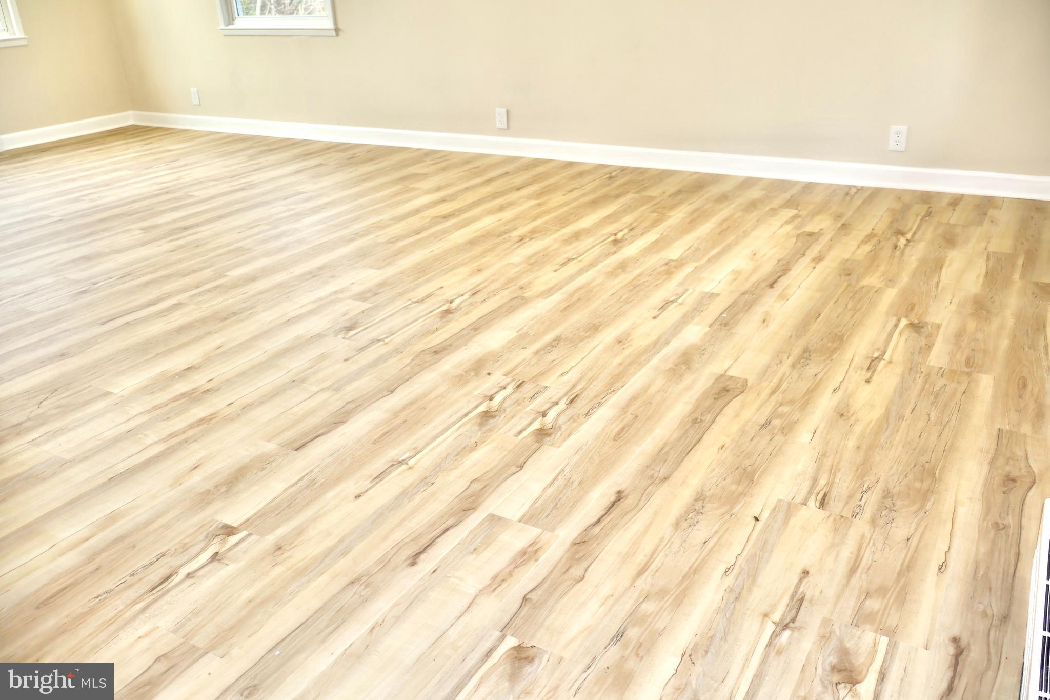 147 Deacon Road Fredericksburg, VA 22405 - Photo 10 of 97 a view of an empty room with wooden floor