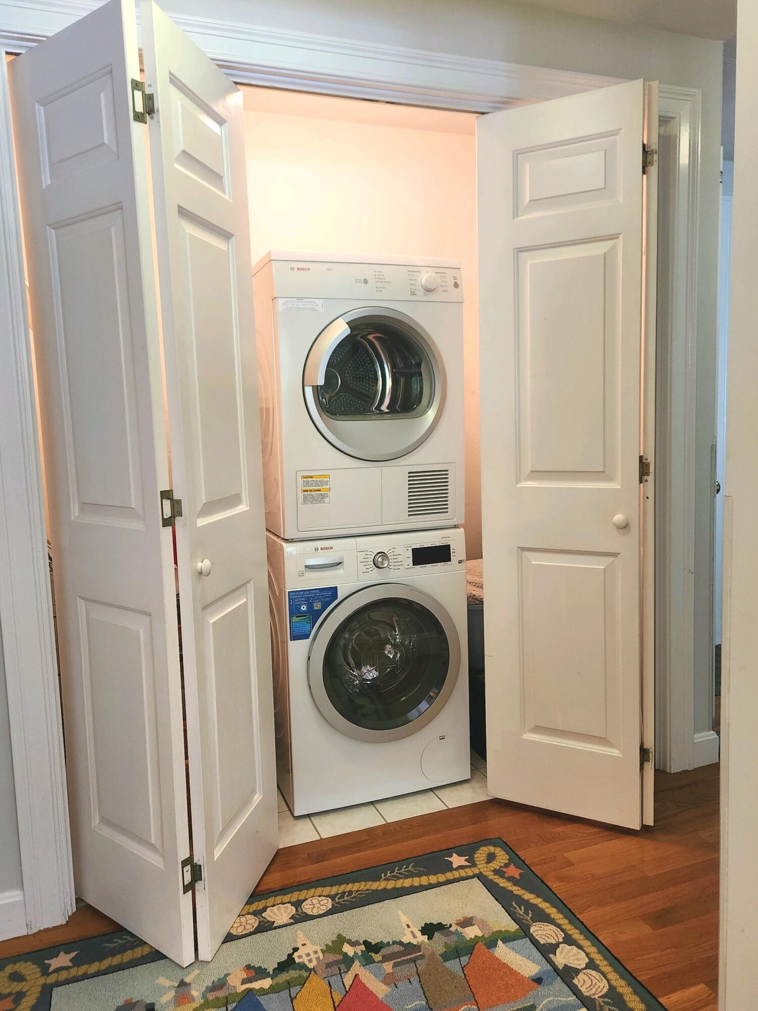 155 Far Fields Road Brewster, MA 02631 - Photo 18 of 40 a utility room with dryer and washer