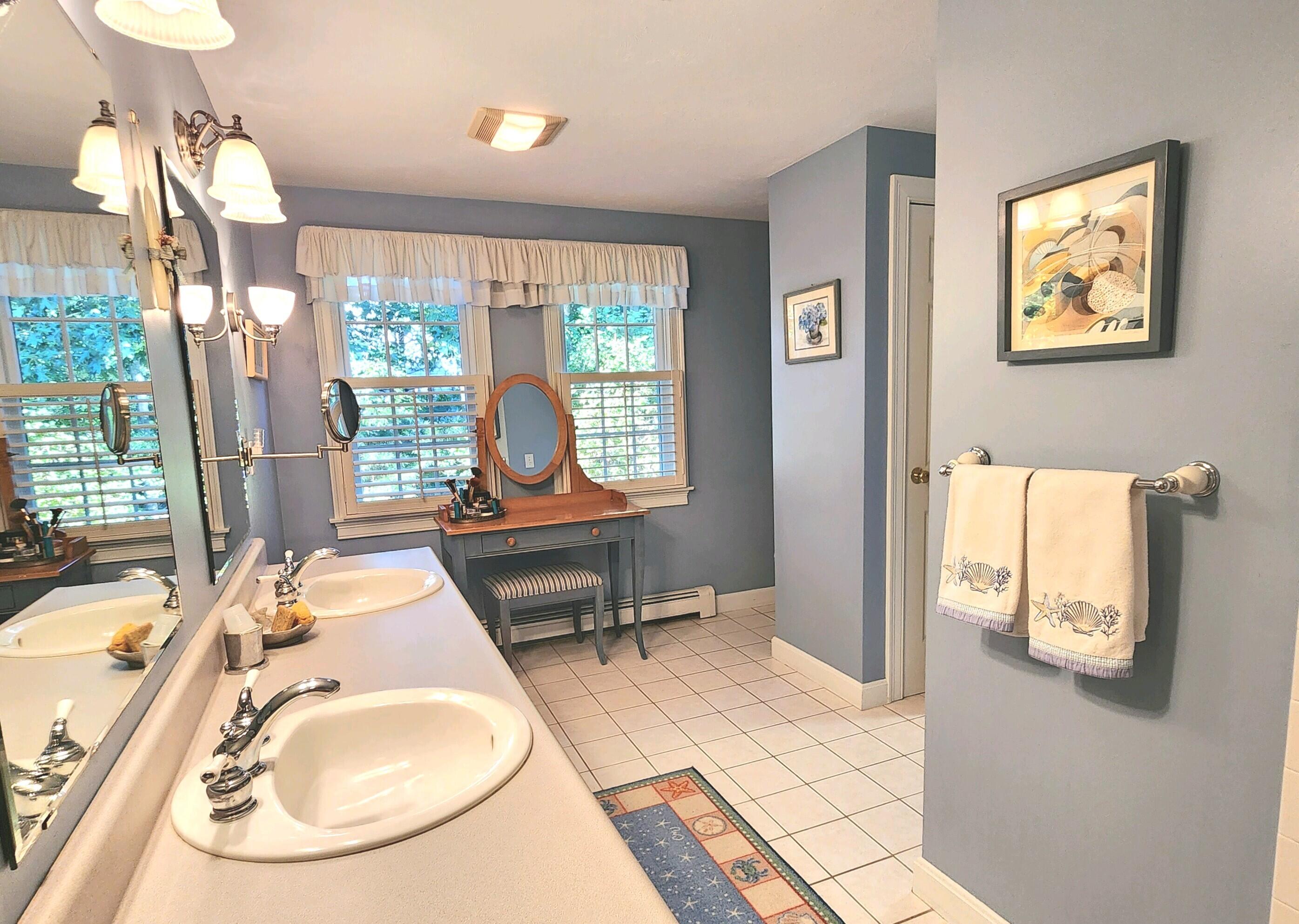 155 Far Fields Road Brewster, MA 02631 - Photo 21 of 40 a living room with furniture and a window