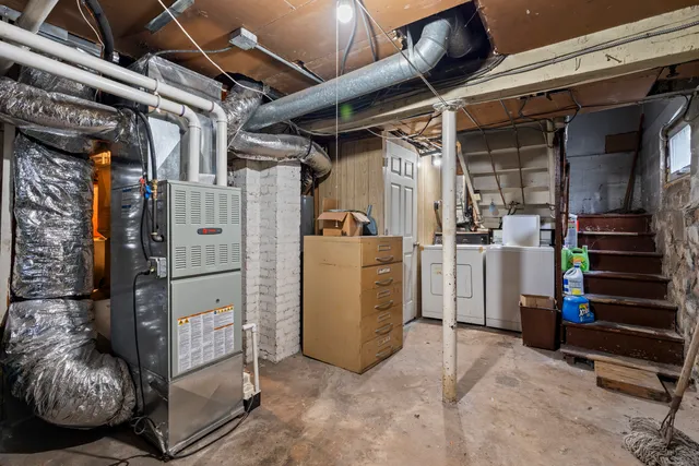 a view of a city street with tall buildings
