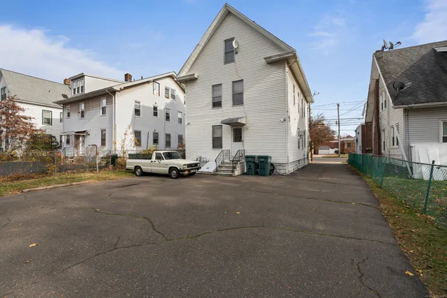 a view of a car in front of house