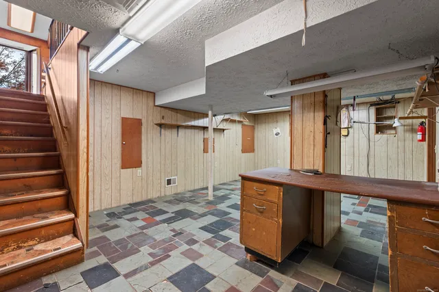 a bathroom with a sink and a shower