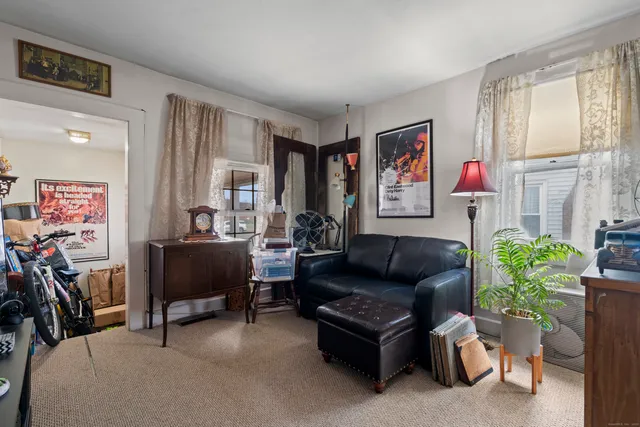 a kitchen with stainless steel appliances granite countertop a stove a sink dishwasher and a refrigerator