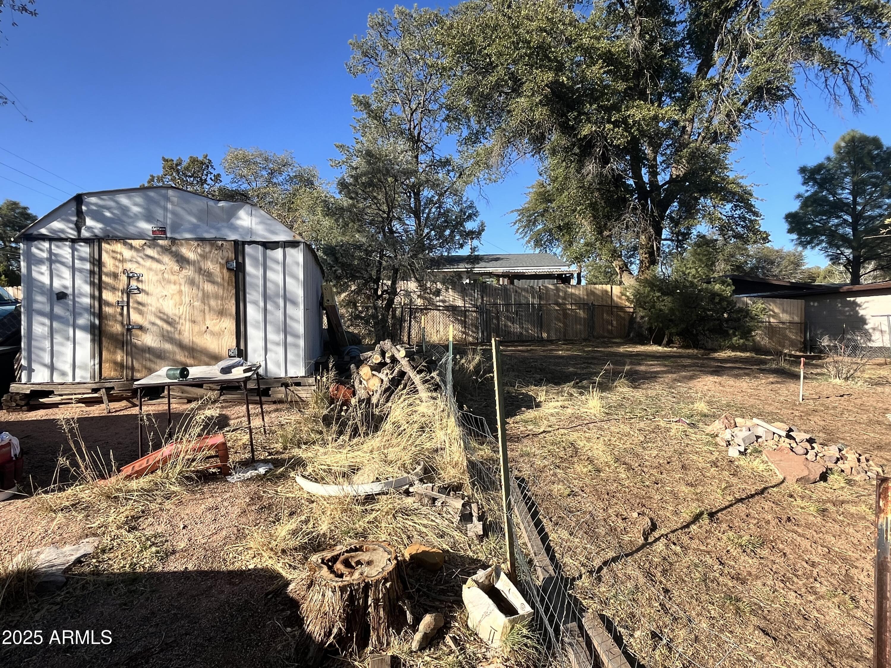 205 South Granite Drive Payson, AZ 85541 - Photo 3 of 5 a view of a yard with a tree