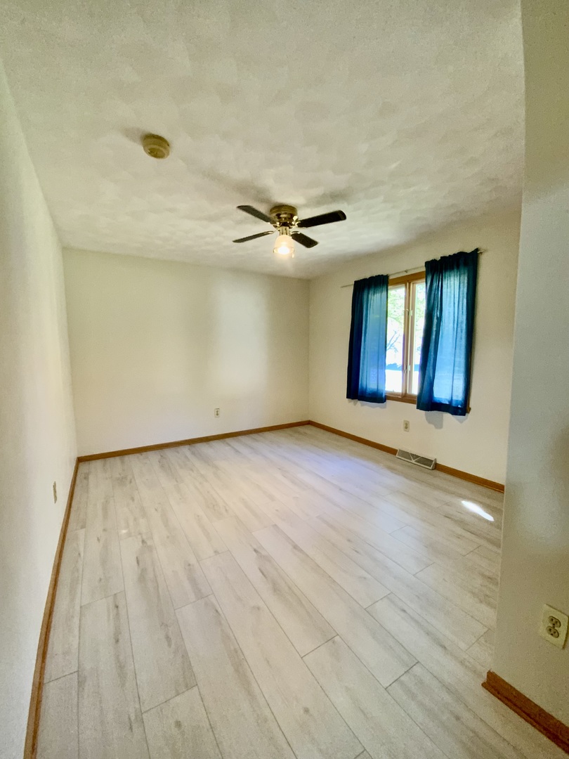3121 Carefree Drive Rockford, IL 61114 - Photo 15 of 29 wooden floor in an empty room