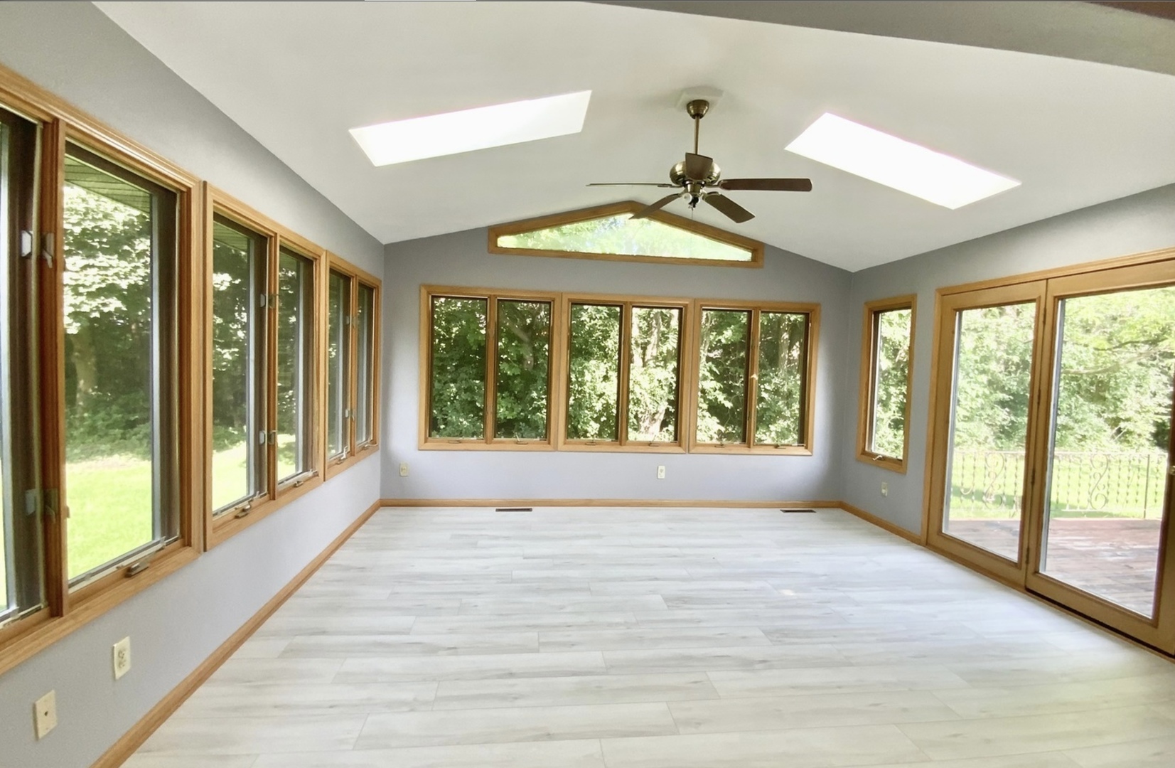 3121 Carefree Drive Rockford, IL 61114 - Photo 19 of 29 a view of room with window and a ceiling fan