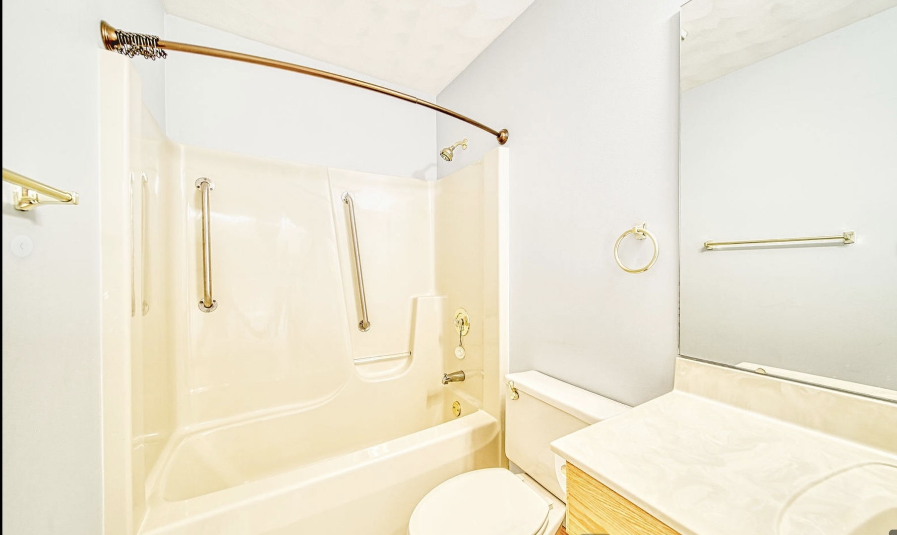 3121 Carefree Drive Rockford, IL 61114 - Photo 21 of 29 a bathroom with a granite countertop sink toilet and shower