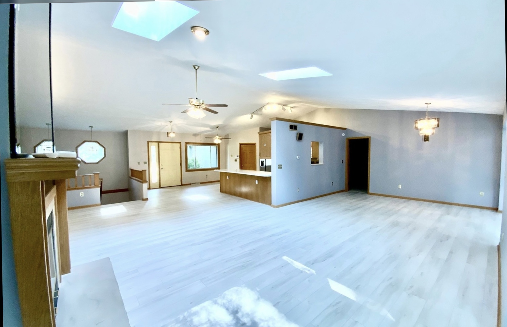 3121 Carefree Drive Rockford, IL 61114 - Photo 7 of 29 a view of a kitchen with a sink and a chandelier