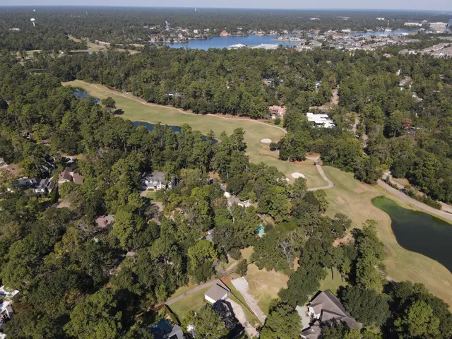 an aerial view of residential house with parking space